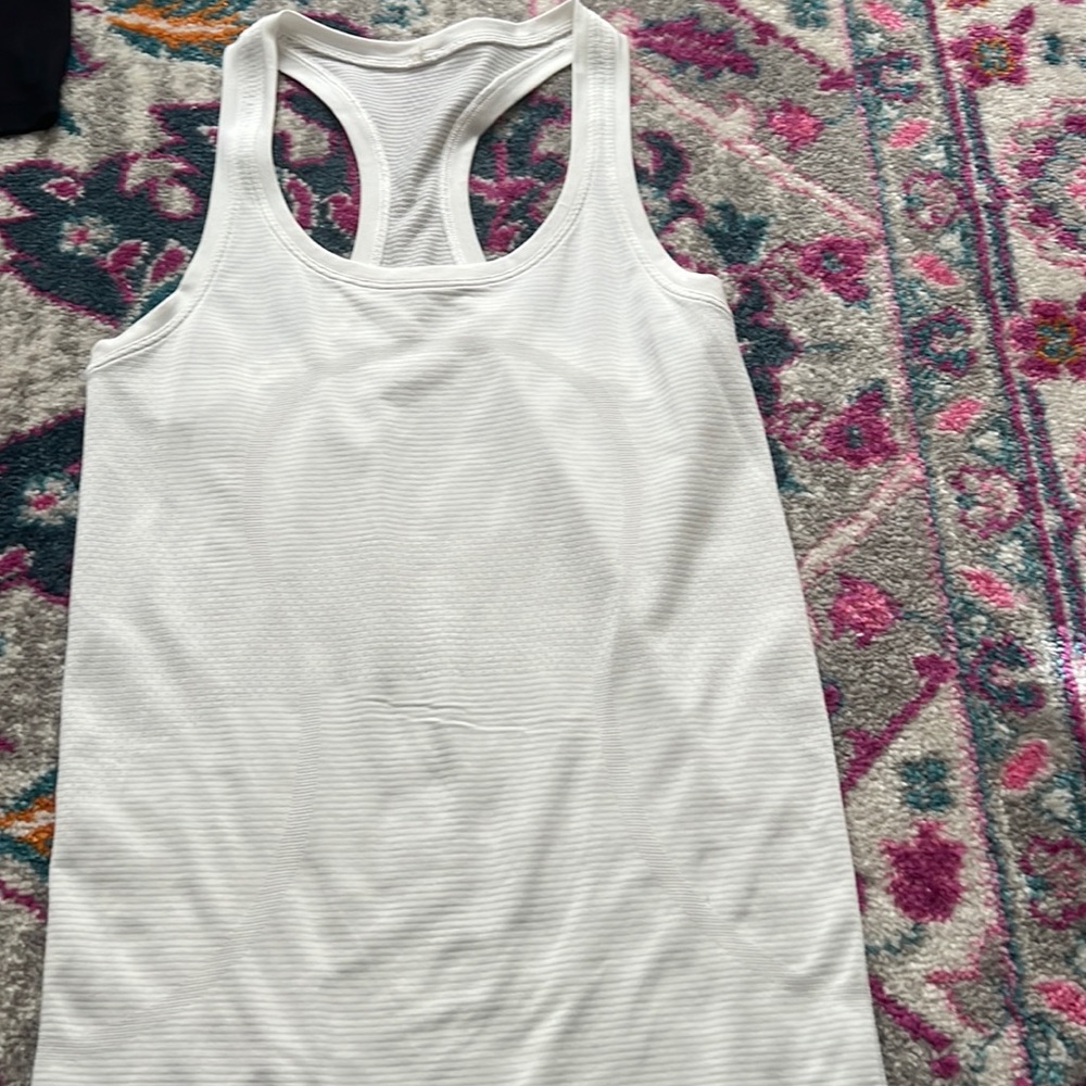 white swiftly tank top